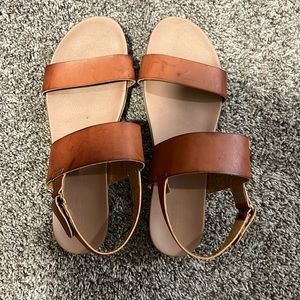 Two strapped sandals